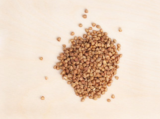 Buckwheat on a wooden surface.