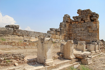 The ruins of the ancient Hierapolis city next to the travertine pools of Pamukkale, Turkey.