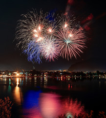 Beautiful firework display for celebration on the Grda Lake,italy,Brightly Colorful Fireworks