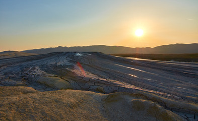 Sunrise in the Muddy Volcanoes National Reservation  in Romania,Berca,Buzau,Vulcanii Noroiosi. Muddy Volcanoes landscape.