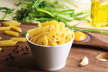 Penne rigate. Macaroni in the form of feathers. mostaccioli pasta