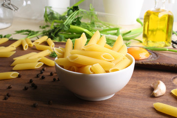 Penne rigate. Macaroni in the form of feathers. mostaccioli pasta