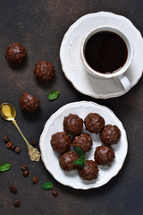 Chocolate shonfet with praline and mint with a cup of custard.