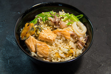 Japanese or Thai or Korean seafood meal. Noodles.