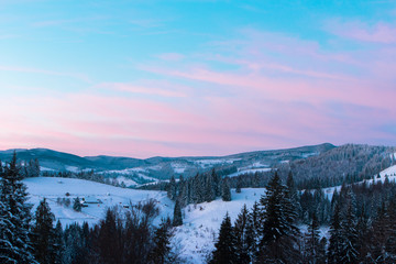 Sunrise on a winter mountains