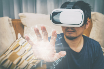 A man wearing and playing virtual reality on isolated white background
