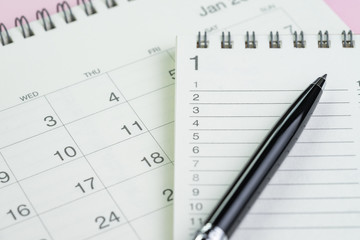 New year to do list , goals or target concept by notepad with list number and pen on calendar