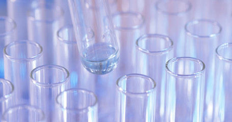 Pipette dropping sample into test tube