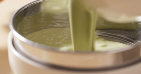 Mixing flour and water on bowl