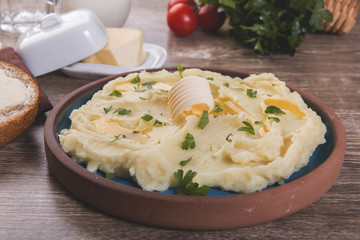 mashed potatoes with butter on a plate homemade