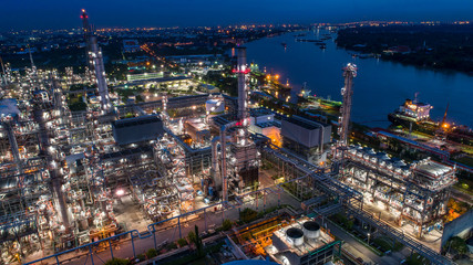 Fototapeta na wymiar Aerial view of Oil and gas industry - refinery, Shot from drone of Oil refinery and Petrochemical plant at twilight, Bangkok, Thailand