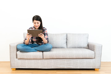 smiling beauty girl using mobile digital tablet