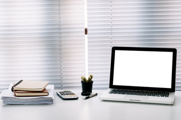 Mock up of blank laptop on the desk