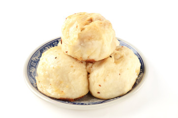 Fototapeta na wymiar Chinese fried bun on white background 