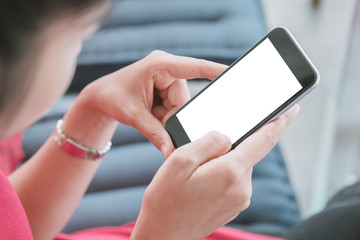 Woman relaxing while using smartphone