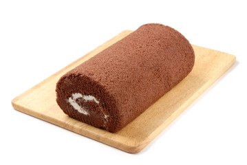 Swiss Roll  on the wooden cutting board      