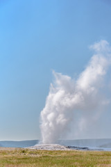 Eruption of Old Failthful Geyser at Yellowstone National Park