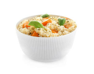 Bowl with delicious pumpkin risotto on white background