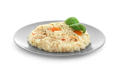 Plate with delicious pumpkin risotto on white background