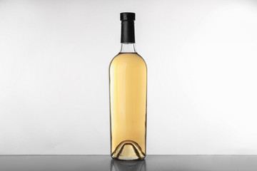 Bottle with wine on white background
