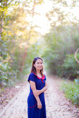 Asian women wear native dress and  live in Thailand.