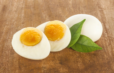 boiled eggs on wooden cutting board