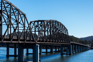 Steel road bridge spanning Hawkesbury river at Brooklyn, Australia