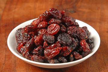  Red berries on white plate 