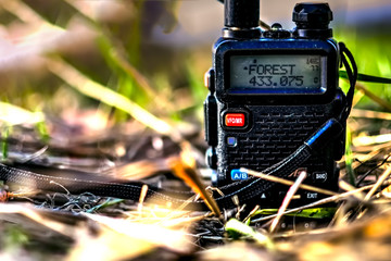 Walkie-talkie in the grass with