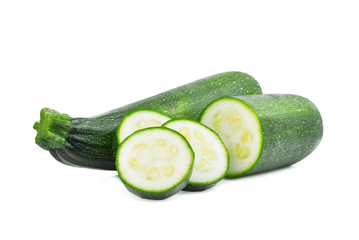 fresh green zucchini with slice isolated on white background