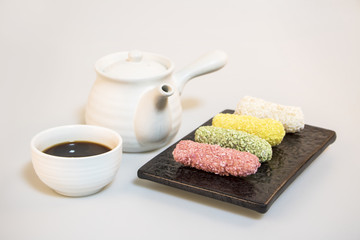 Korea traditional cookies on the dish. teapot. tea