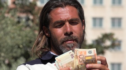 Caucasian Male Counting Money