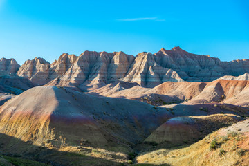 Obraz premium Landscape Photography of Eroded hills & mountains at Badlands National Park