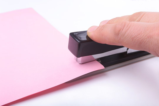 The stapler is used in the office to manually connect paper.