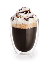 Coffee with whipped cream in a glass with double walls isolated on white background. Chocolate sauce.