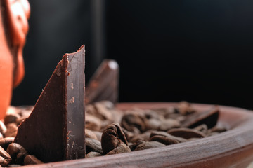 Piece of black chocolate in