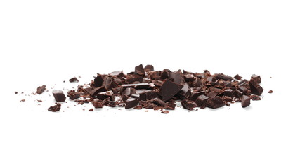Pile chopped, milled cocoa chocolate bars and shavings isolated on white background
