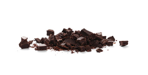 Pile chopped, milled cocoa chocolate bars and shavings isolated on white background