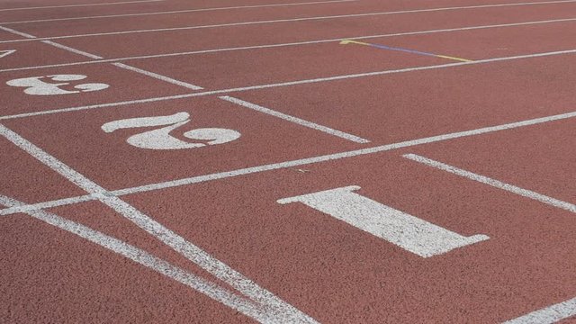 Two athletes crossing finish line showing same result, equal forces, competition