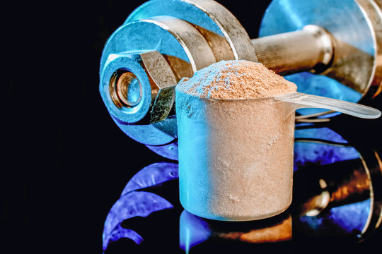 Measuring scoop with whey protein