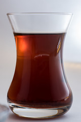 Turkish tea in traditional glass isolated on white
