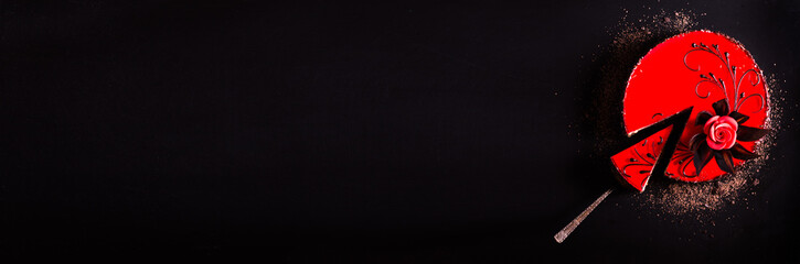 Red cake with rose on white concrete background. Top view. Valentine's Day and love concept. Copy...