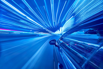 View from Side of Car moving in a night city, Blured road with lights with car on high speed....