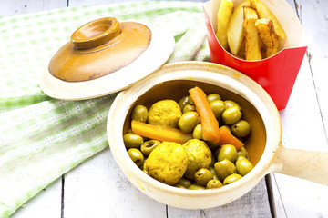 arabic tajine food of green olives with kufta and fried potato