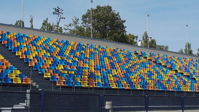 Athletes training relay race on empty stadium, teamwork, aspiration to win