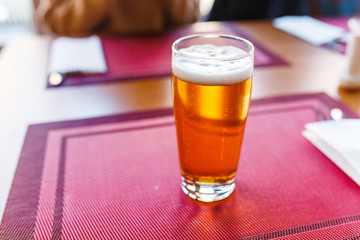 glass of beer in a restaurant