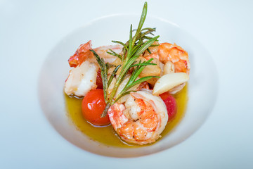 Appetiser with prawns,tomatoes,garlic and olive oil