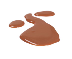 Spilled chocolate milk puddle isolated on white background