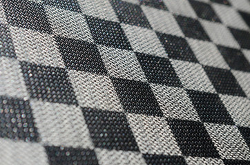 Plastic texture in the form of a very small cloth binding, painted in black and gray in the style...
