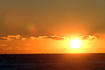 Fototapeta na wymiar fiery sunset over the sea